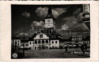 1938 Brassó, Kronstadt, Brasov; Sfatul, Loteria-Stat, Drogueria, Fonciera, Optica / Városháza, Wlaat &amp; Wlaat, Viktor Butyka, Tellmann üzlete, étterem, drogéria, optika, Fonciere Biztosító, lottózó, automobil, teherautó / town hall, shops, lottery, restaurant, pharmacy, optics, insurance, automobile, truck. photo