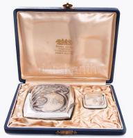 cca 1900 Sárga János (1868-1916) Kolozsvár ékszerész, órás, műötvös, császári és királyi szállító által forgalmazott ezüst (Ag) cigarettatárca és gyufatartó, tokjában. Jelzett, G.L. mesterjeggyel, Sárga János márkázott tokban, monogramos, 5x4,5cm, 9x11,5cm, bruttó 191g /// c. 1900 Silver (Ag) cigarette case and match holder, retailed by János Sárga (1868?1916), jeweler, watchmaker, and goldsmith in Cluj (Kolozsvár), purveyor to the Imperial and Royal Court. Marked with G.L. master's mark, in original case branded by János Sárga. Monogrammed. Dimensions: 5 × 4.5 cm, 9 × 11.5 cm. Gross weight: 191g.