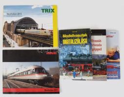Vasútmodellezés témájú könyvek és katalógusok, össz. 5 db: Ulrich Lieb: Modellvasutak digitalizálása.; Modellvasút-tervezés számítógéppel.; Modellvasút kezdőknek és gyerekeknek.; Märklin és Trix katalógusok. Vegyes állapotban.