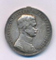 1917. "Károly Ezüst Vitézségi Érem II. osztálya" peremén jelzett Ag kitüntetés mellszalag és fül nélkül. Szign.: "Kautsch" T:VF, fülnyom, karc Hungary 1917. "Silver Gallantry Medal, 2nd Class" Ag decoration with hallmark on the edge, without ribbon and ear. Sign.: "Kautsch" C:VF, earmark, scratch NMK 306.