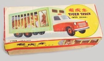 cca 1975 Metal Factory Tiger Truck MF 239 tigrisszállító cirkuszi autó lemezjáték. Kína, fémlemez, eredeti, kissé sérült dobozában, jó állapotban, lendkerekes, h: 25,5 cm  ///  c. 1975 Metal Factory Tiger Truck MF 239 Circus Tiger Transport Tin Toy. Made in China, tinplate construction, original box (slightly damaged), in good condition. Friction drive mechanism, length: 25.5 cm.