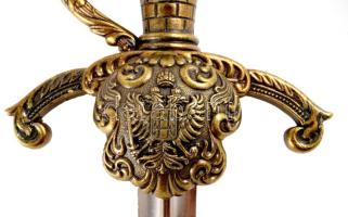 Denix fantázia tőr, tömör fém markolattal, kétfejű sasos címer díszítéssel, hüvellyel, h: 45 cm