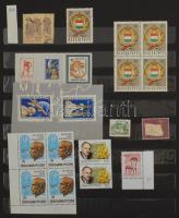 12 fekete lapos nagyalakú berakó, zöld borítóval, benne magyar tétel az 1910-1958 közötti időszakból...