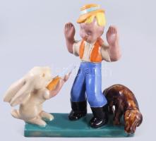 Komlós. A nyúl viszi a puskát. Vadász a kutyával. Mázas kerámia. Jelzett, hibátlan 28x27 cm /// Komlós. The Rabbit Carries the Rifle. Hunter with Dog. Glazed ceramic. Signed, flawless, 28 × 27 cm.