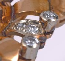 Arany (Au) bross, 14k, benne 0,01ct; 0,02ct; 0,05ct méretű gyémántokból összesen cca 0,9-1ct gyémánt...