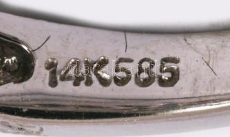 14K fehérarany gyűrű ametiszttel, (10mm) és brillekkel éklítve. Jelzett, egy tartó karom vége sérült...