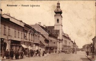 Kolozsvár, Cluj; Kossuth Lajos utca, üzletek, templom. Weiszfeiler Sándor kiadása / street view, shops, church (fl)