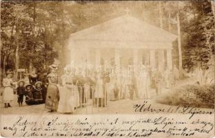 1900 Szliács, Sliac; társaság a Hildegárd kápolna előtt / people in front of the chapel. photo + "ZÓLYOM-BREZO - ZÓLYOM 98. SZ." vasúti mozgóposta bélyegző (felületi kopás / worn surface)