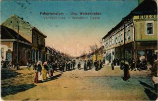 1918 Fehértemplom, Ung. Weisskirchen, Bela Crkva; Vendelin utca, Milan Jovanovits üzlete, Ruzsicska szálloda. P. Kuhn kiadása / Wendelini Gasse / street view, hotel, shops (EB)