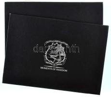 Két darab éremtartó tálca "Republic of Liberia - Moments of Freedom" emlékérmék tárolására 24db férőhellyel. Használt állapotban.