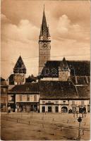 1947 Medgyes, Mediasch, Medias; Piata Regele Ferdinand. Hans Harth / Ferdinand király tér, M. Hann fodrász üzlete / square, shops, hairdresser (fa)