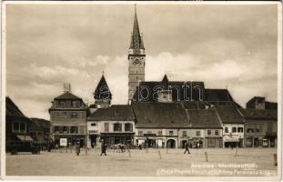 1931 Medgyes, Mediasch, Medias; Piata Regele Ferdinand / Ferdinand király tér, autóbusz, gyógyszertár, Friedrich Oberth, Gustav Carthmann, M. Hann fodrász, Edmund Unruh, Ipsen &amp; Co. üzlete, Bonbonerie Corso / square, bus, shops, hairdresser, pharmacy (EK)