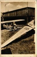 A hangár előtt, Turul repülőgép. Sturm Vilmos Károly felvétele, Levente és Cserkészbolt kiadása (lyukak / pinholes)