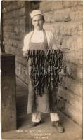 Junction City (Kansas), butcher with sausages. E. D. Zellner photo (cut)