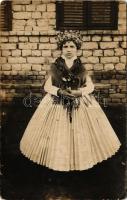Leány népviseletben, pártával / Girl in folk costume. photo (EM)
