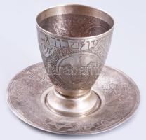 Ezüst (Ag) Kiddus pohár alátéttel. cca 19. sz. utolsó harmada, jelzett, mesterjeggyel, m: 9,5 cm, d: 13,5 cm, nettó 286g /// Silver (Ag) Kiddush cup with saucer. c. late 19th century, hallmarked, with maker's mark, height: 9.5 cm, diameter: 13.5 cm, net weight: 286 g."