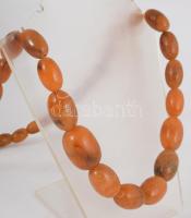 Borostyán nyaklánc, klf méretű szemekből.