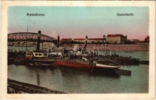 1915 Komárom, Komárno; Duna részlet, "TORONTÁL" oldalkerekes vontató gőzhajó, lebontott kerékállással, javításon a MFTR komáromi hajóműhelyében. A háború után jugoszláv hadizsákmány / TORONTÁL sidewheeler steam tug, undergoing repairs at the Komárno shipyard. Torontál was requisitioned for service on the Danube by the k.u.k. Zentraltransportleitung (ZTL). She was claimed as a war prize by the new Yugoslav state in 1918. (EK)