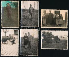 II. világháborús katonai fotók, egyiken a feleség viseli a katonaruhát, 10 db, felületi sérülésekkel, 8,5×6 cm