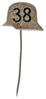 Osztrák-Magyar Monarchia ~1917. A Császári és királyi 38. gyalogezred rohamsisak alakú, festett tombak jelvénye, fekete zománcozott számokkal, függőleges tűvel. (15x22mm) T:AU halvány patina Austro-Hungarian Monarchy ~1917. Helmet shaped alloy badge of the Kaiserliche ung Königliche 38th Infantry Regiment, with black enamelled numbers and vertical pin. (15x22mm) C:AU faint patina