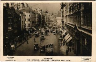 1930 London; The Strand, Looking towards the city, street view, traffic, automobile, horse carriage, shops, pedestrian, George Burch tailor, Spooner and Co photographers, Slaters Restaurant, Earlsfield, Terry's cinema, Palace Hotel. Samuels Ltd. (EK)