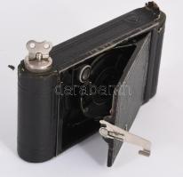 Kodak harmonikás kamera, beragadt, nem nyitható, hozzá egy régi filmtekercs és kioldó,