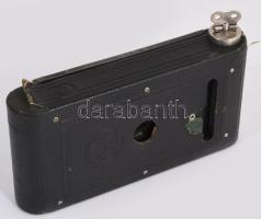 Kodak harmonikás kamera, beragadt, nem nyitható, hozzá egy régi filmtekercs és kioldó,