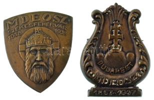 1937. "MDEOSZ (Magyar Dalos Egyesületek Országos Szövetsége) - Budapest 1867-1937" bronz lemezjelvény ép tűvel(41x31mm) + 1938. "MDEOSZ Székesfehérvár (Magyar Dalos Egyesületek Országos Szövetsége)" bronz lemezjelvény ép tűvel (31x35mm) T:AU, patina