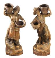 cca 1885-1910 Johann Maresch Fiú kosárral ás korsóval, Lány kosárral és korsóval szoborpár. Terv: August Otto. Engóbozott terrakotta, jelzett, minimális kopással, m: 46 cm /// c. 1885?1910 Johann Maresch "Boy with Baskets and Jugs" and "Girl with Baskets and Jugs" - Pair of Sculptures. Design: August Otto. Engobed terracotta, signed, with minimal wear, height: 46 cm.