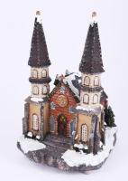Elemmel működő világító és zenélő karácsonyi templom asztaldísz, használatlan, eredeti dobozában, elemtartó fedője nélkül m: 26 cm