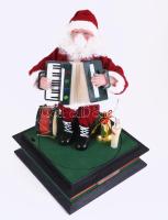 Elemmel működő táncoló-zenélő mikulás, újszerű, eredeti dobozában, m: 27 cm