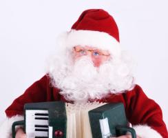 Elemmel működő táncoló-zenélő mikulás, újszerű, eredeti dobozában, m: 27 cm