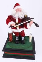 Elemmel működő táncoló-zenélő mikulás, újszerű, eredeti dobozában, m: 29 cm
