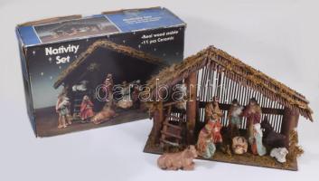 Betlehemi jászol, 11 darab porcelán figurával (egyik sérült), dobozában, 40x26 cm