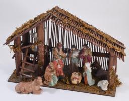 Betlehemi jászol, 11 darab porcelán figurával (egyik sérült), dobozában, 40x26 cm