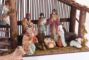 Betlehemi jászol, 11 darab porcelán figurával (egyik sérült), dobozában, 40x26 cm