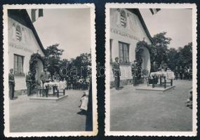 cca 1930-1940 Ünnepség egy iskola előtt, az épület falán (magy.) kir. állami népiskola felirattal és angyalos címerrel, 2 db fotó, 9x6 cm