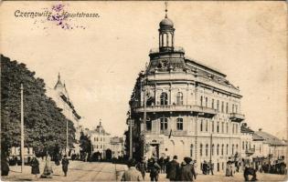 1916 Chernivtsi, Czernowitz, Cernauti, Csernyivci (Bukovina, Bucovina, Bukowina); Hauptstrasse, Zentrale Technischer Artikel. Leon König / main street, shops, tram + "K.u.k. Feldpostamt 71" "K.u.k. Kraftwagen-Kolonne Klosterneuburg 9." (wet damage)