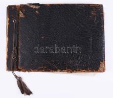 cca 1915-1945 Régi fotóalbum vegyes családi képekkel, összesen kb. 140 db beragasztott fotóval, sérült bőrkötésű albumban, 19x27,5 cm