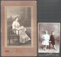 2 db keményhátú fotó: Kisfiú és kislány portréja, Petrovich Elek zilahi műterméből, 16,5x11 cm + Elegáns fiatal hölgy portréja, Kossak József budapesti műterméből, a karton szélén kis sérülésekkel, 27,5x17,5 cm