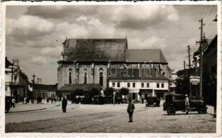 1939 Torda, Turda; tér, templom, Tunel étterem, gyógyszertár, Balogh üzlete, automobilok / square, church, restaurant, pharmacy, shops, automobiles. photo
