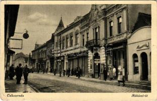 1943 Csíkszereda, Mircurea Ciuc; Rákóczi út, üzletek, magyar katonák. Péter F. kiadása / street view, shops, Hungarian soldiers (EB)