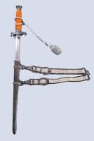 Wehrmacht 1935M tiszti dísztőr WKC Solingen gyártói jelzéssel, kissé sérült bakelit markolattal, csatlékkal, kardbojttal. Beregfy Károly (1888-1946), a Szálasi kormány később kivégzett hadügyminiszterének hagyatékából, hozzá családi dokumentumaik cca 1920-1955 feleségének és lányának okmány hagyatéka. 15 db irat: magyarországi bizonyítványok, származási igazolások, német emigrációban kelt igazolások, halotti értesítők, névváltoztatási engedély / Wehrmacht 1935M Third Reich Army officers' dress dagger with small damage on the grip / Heer (WH) Dolch für Offiziere . with family documents