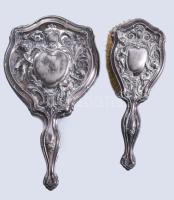 Neobarokk kézi tükör és ruhakefe. Ezüst (Ag) borítással, hátoldalon plasztikus puttó díszítéssel. 26 cm, 22 cm,