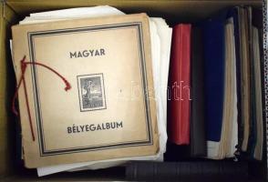 Nagy tétel, benne főleg üres berakók és albumok, 11 db nagyalakú berakó és 7 db közepes berakó, 9 db előnyomott album, több száz vegyes magyar és külföldi bélyeg, tízesek, bündlik, ívek, ívdarabok, stb. Érdemes átnézni! 2 db dobozban