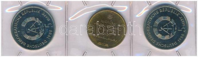 Német Demokratikus Köztársaság 1988A 5M "Németország első vasútja" + 1988A 5M "Rostock" + "Szállítmányozás" emlékérem, 3db-os érme szett, lezárt, eredeti tokban, tanúsítvánnyal T:UNC German Democratic Republic 1988A 5 Mark "Germany's First Railroad" + 1988A 5 Mark "Rostock" + "Verkehrswesen - Transportation in GDR" medallion, 3pcs coin set in sealed, original case, with certificate C:UNC