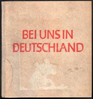 Heiss, Friedrich: Bei uns in Deutschland. Ein Bericht. Berlin, 1938, Volk und Reich. Fekete-fehér fotókkal gazdagon illusztrálva. Német nyelven. Kiadói félvászon-kötés, kissé foltos borítóval, belül nagyrészt jó állapotban.