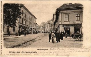 1901 Nagyszeben, Hermannstadt, Sibiu; Heltauergasse / Disznódi utca, Julius Wermescher, Carl Landmann üzlete, Transsylvania szálloda. Verlag d. Buchh. G. A. Seraphin. Lichdtruck v. Jos. Drotleff / street view, shops, hotel (gyűrődés / crease)