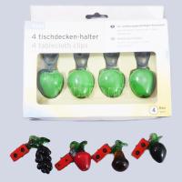 8 darab gyümölcsmintás asztalterítő csíptető, ebből 4 darab üveg