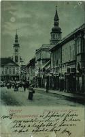 1900 Nagyszombat, Tyrnau, Trnava; Nagy Lajos utca este holdfényben, Fő tér, piac, Manheim Jakab, Herzog R. üzlete. Horovitz Adolf kiadása / street view at night in moonlight, main square, market, shops (b)